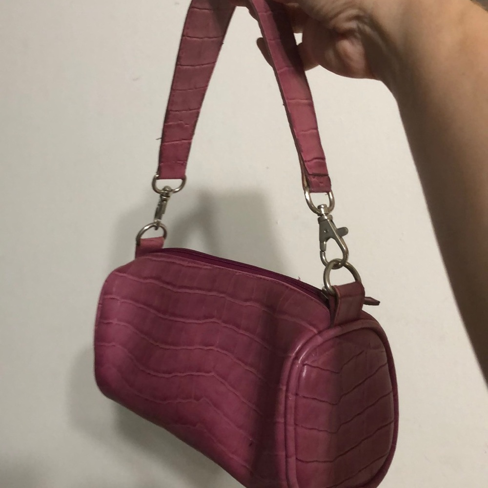 Purple faux leather handbag